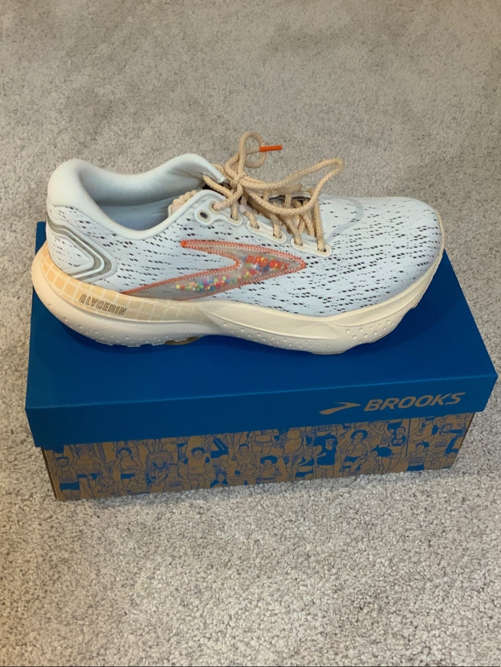 Brooks Light Gray and Cream Running Shoes with Orange Accents